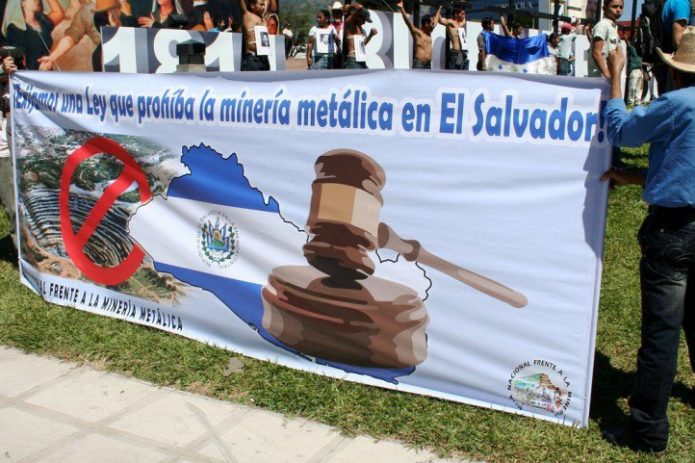 Banner of Salvadorans protest