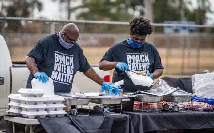 Scenes from the Collard Green Caucus food giveaway, sponsored by Black Voters Matter and A Better Glynn, held at Ballard Park