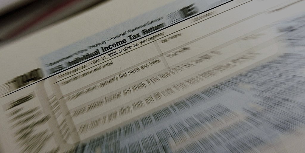 A blurry image of an IRS 1040 document