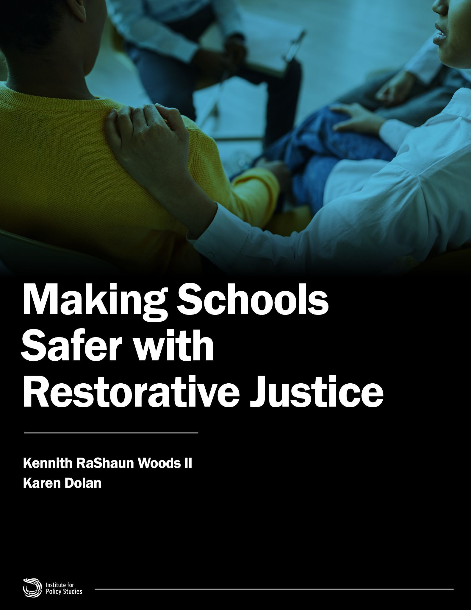 A close up photo of one student putting their hand on the shoulder of another. Report cover for "Making Schools Safer with Restorative Justice."